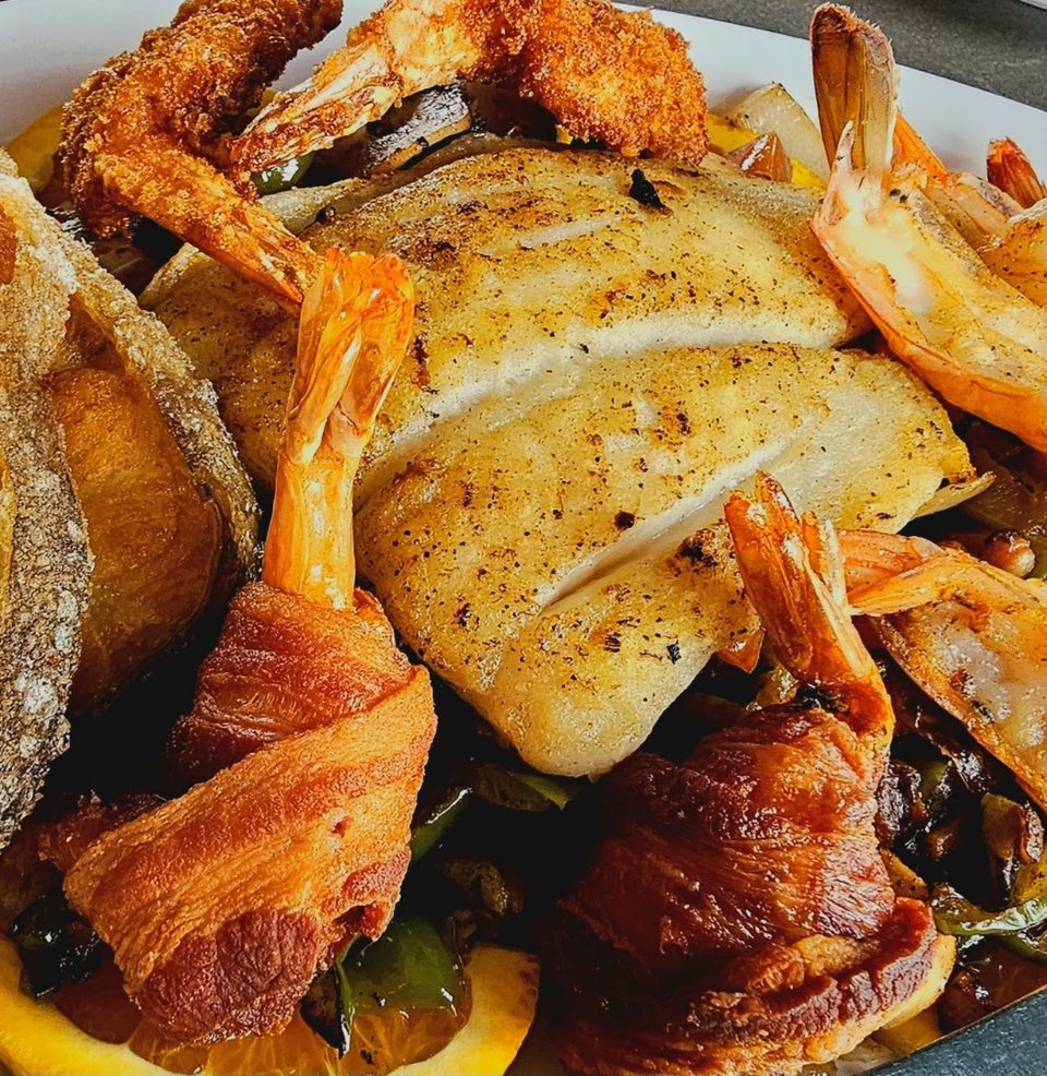 Seafood plates on a casual restaurant table.