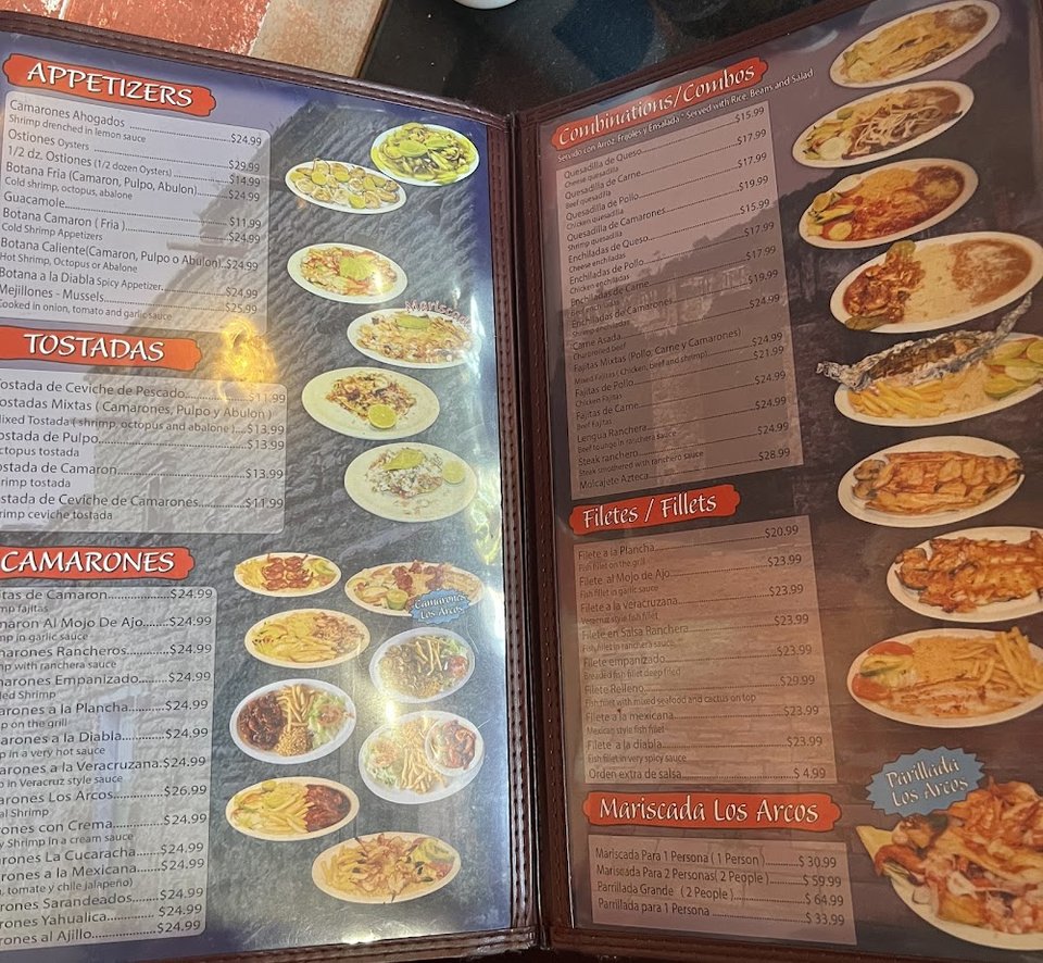 Restaurant menu with combo plates and whole fish.